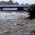 ゲリラ豪雨により氾濫寸前の川